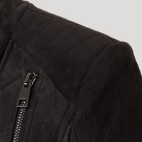 Close-up detail of the Diva jacket's quilted shoulder panels in premium Italian technical suede